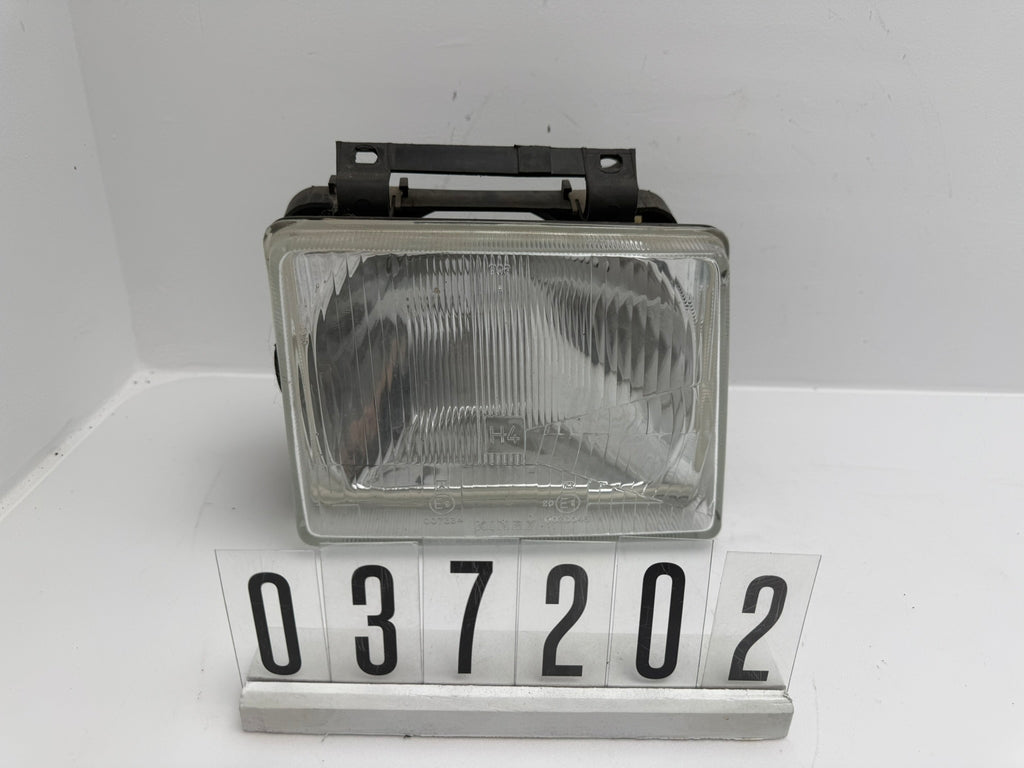 439875; 037 2 02; 215 OPEL CORSA A Scheinwerfer links