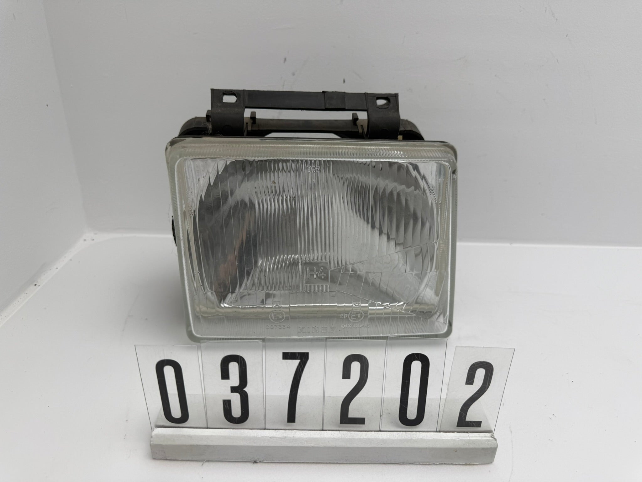 439875; 037 2 02; 215 OPEL CORSA A Scheinwerfer links