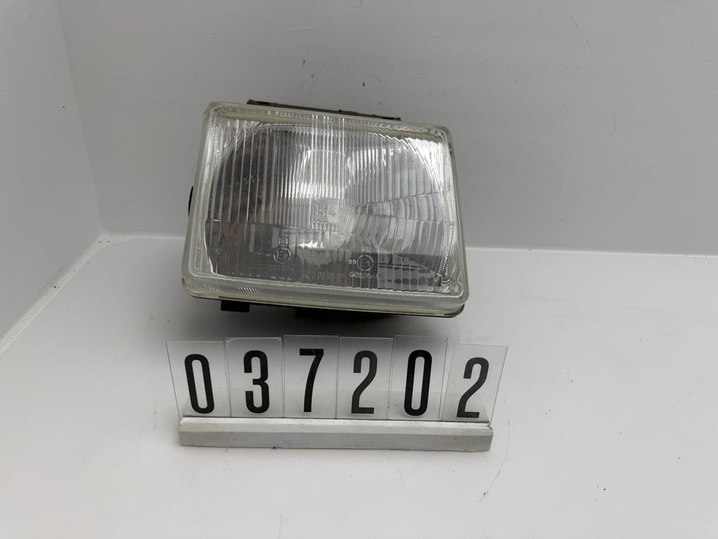 439875; 037 2 02; 215 OPEL CORSA A Scheinwerfer links