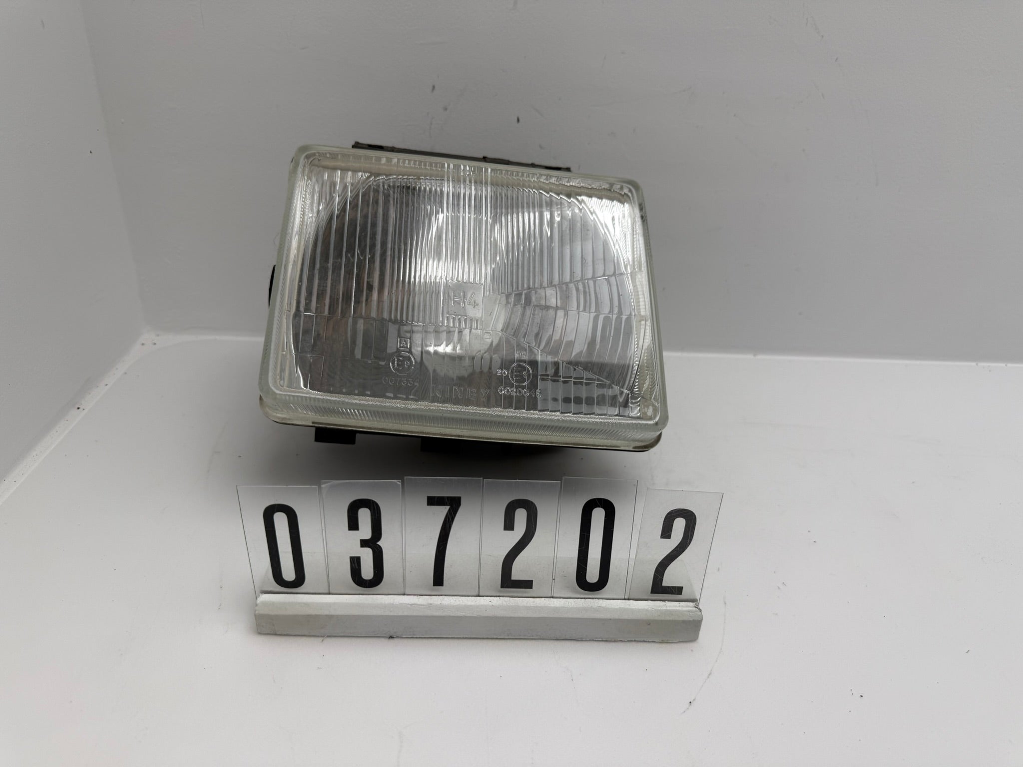 439875; 037 2 02; 215 OPEL CORSA A Scheinwerfer links