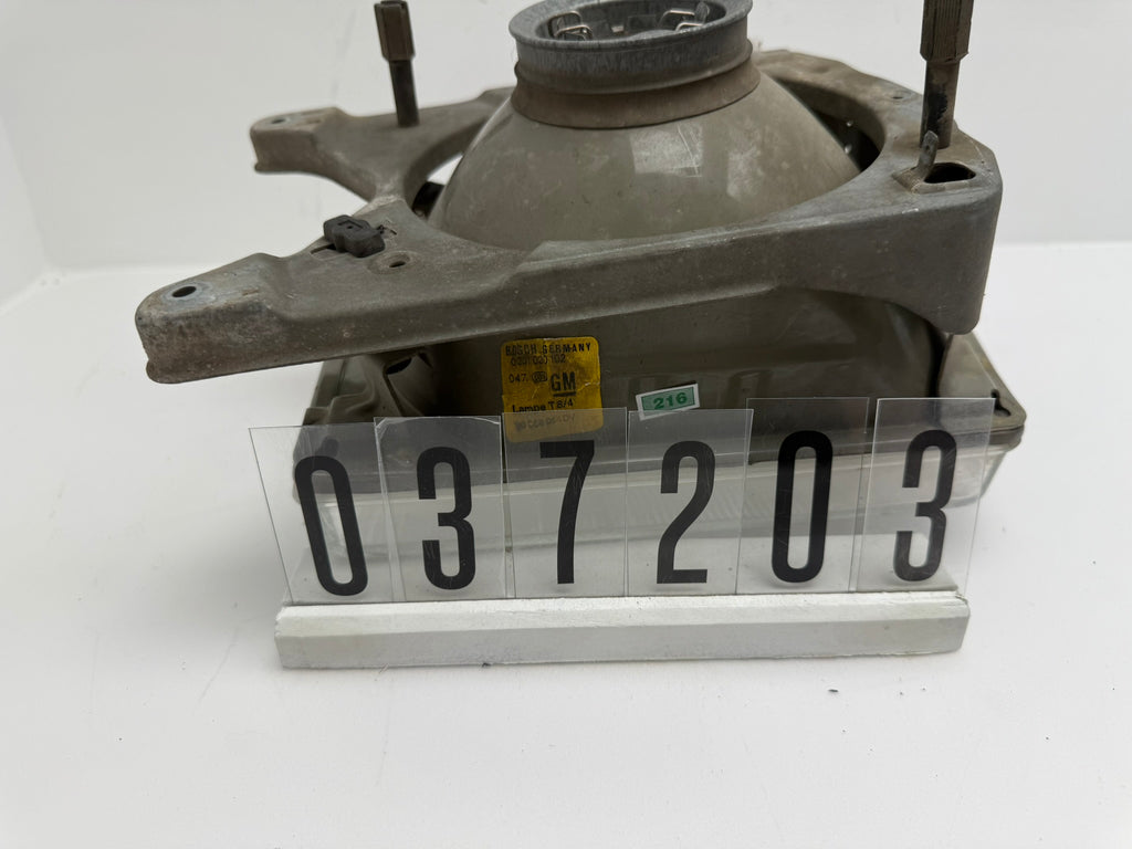 1305620448; 037 2 03-04; 216-217 Opel Kadett D Scheinwerfer H4 Bosch rechts