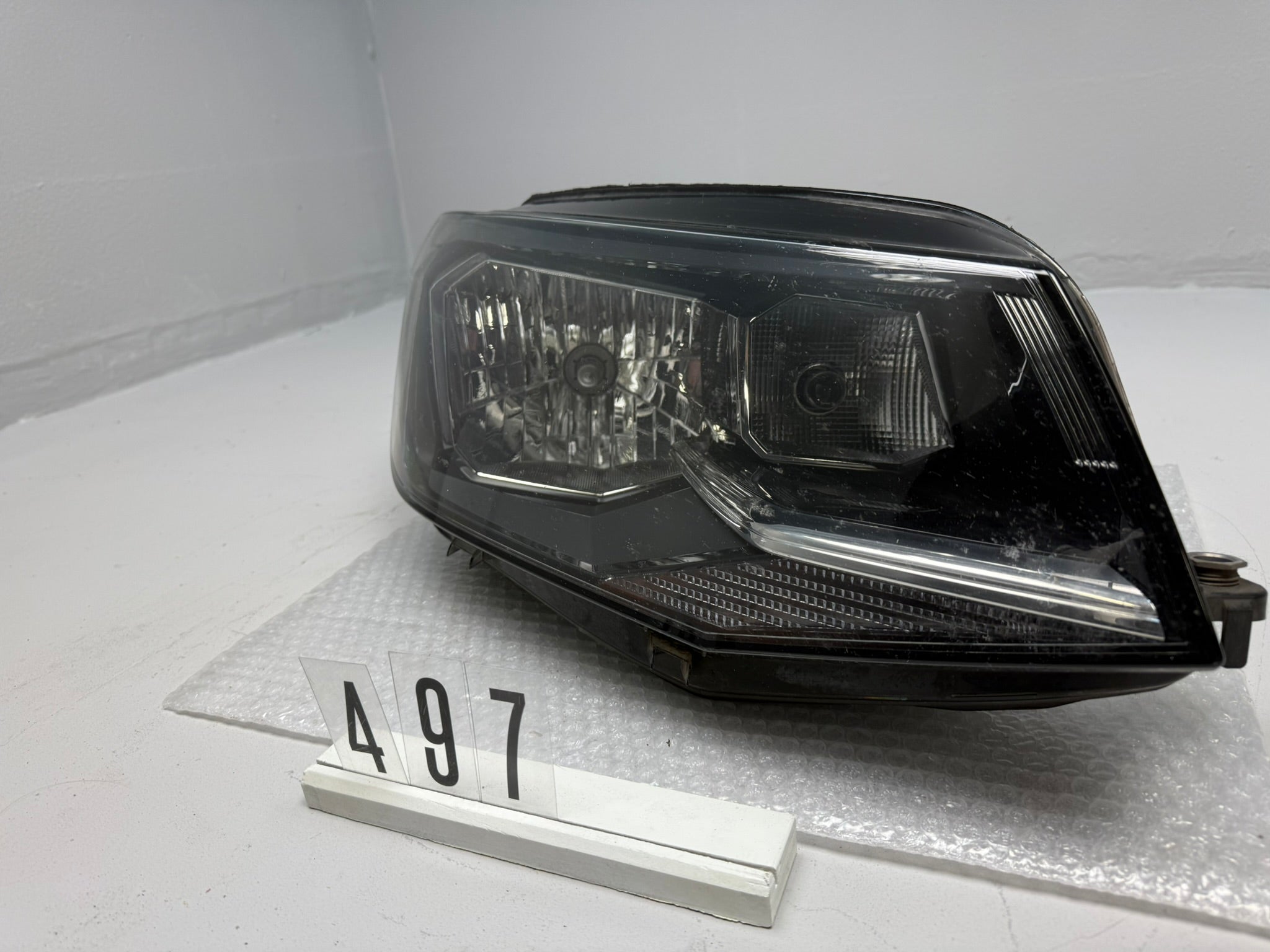 2K1941016B, 497, Original Hauptscheinwerfer rechts HELLA VW CADDY Rechts