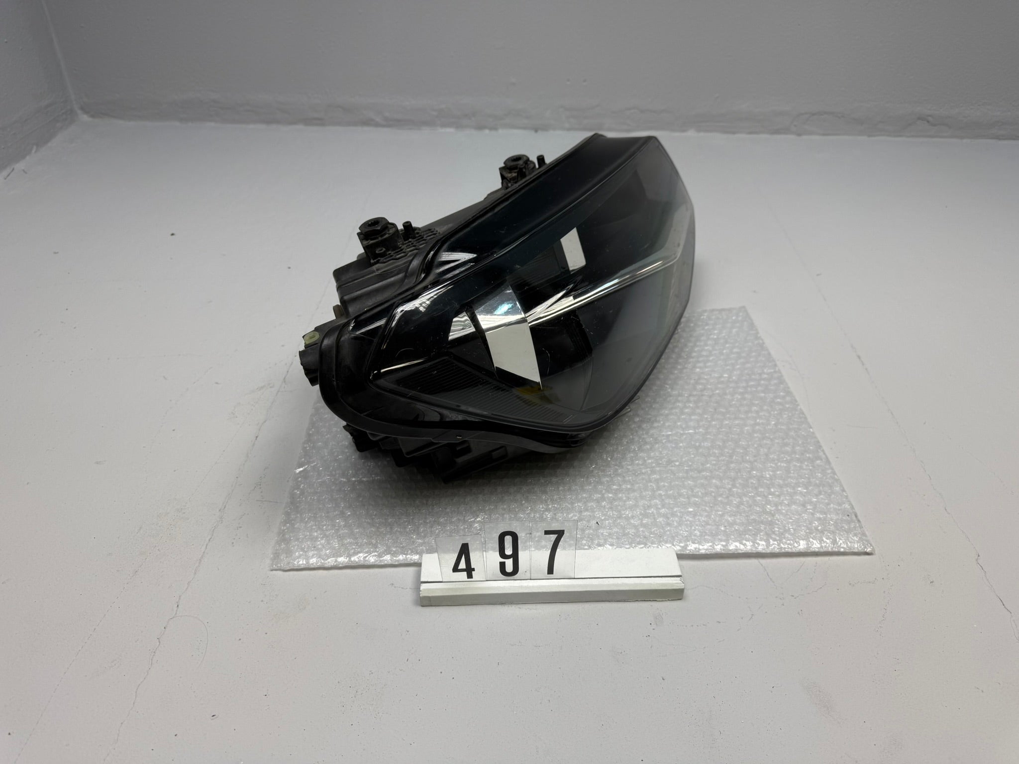 2K1941016B, 497, Original Hauptscheinwerfer rechts HELLA VW CADDY Rechts